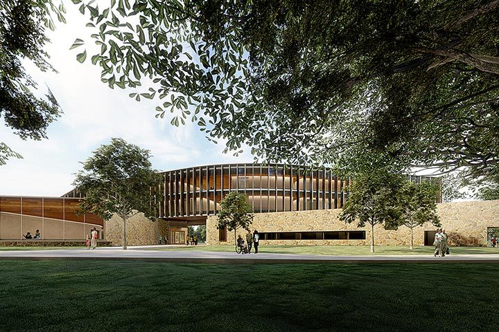 Modern circular building with glass, trees, greenery, path, pedestrians, and cyclists in view.