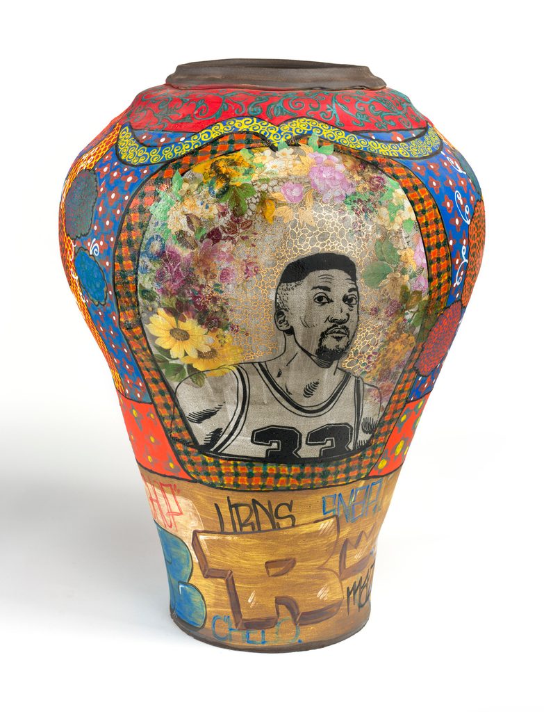 Colorful vase with intricate patterns, floral designs, sports portrait, and graffiti lettering.